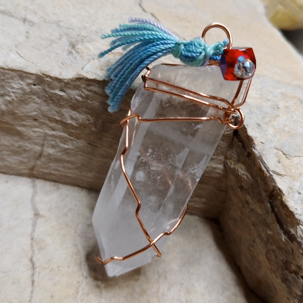 Artisan wire wrapped Quartz crystal with tassel and red crystal pendant